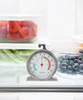Big 3 Inch Dial Refrigerator and Freezer Thermometer With Stainless Steel Casing inside fridge, showing temperature monitoring.