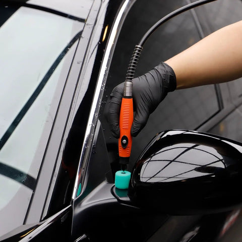Using mini buffing polishing pads set with 32 pieces for rotary tools and cordless drills on car side mirror for smooth finish