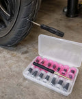 Rock Solid Mushroom Tire Repair Kit With Steel Puller Tool And Compact Carry Case For Cars Trucks Scooters And Electric Bikes No Sweat Roadside Puncture Patch Jobs displayed with tire handling tool and patches.