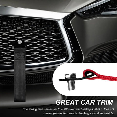 Hella Durable JDM Tow Strap For Cars mounted on car grille with secure steel hook and adjustable nylon strap.