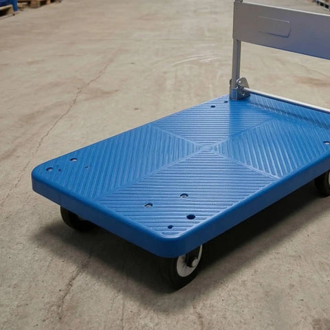 Heavy Duty Folding Transport Cart With Aluminum Handle And Rugged Deck For Easy Box Hauls In Warehouses Labs And Classrooms Four Wheel Push Cart For Daily Use And Reliable Smooth Mobility, blue deck angled view