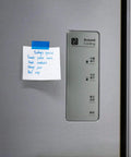 Blue 1/2 Inch Painter Drafting Tape For Crafting And Masking, 55 Yards Long, holding a note on a refrigerator