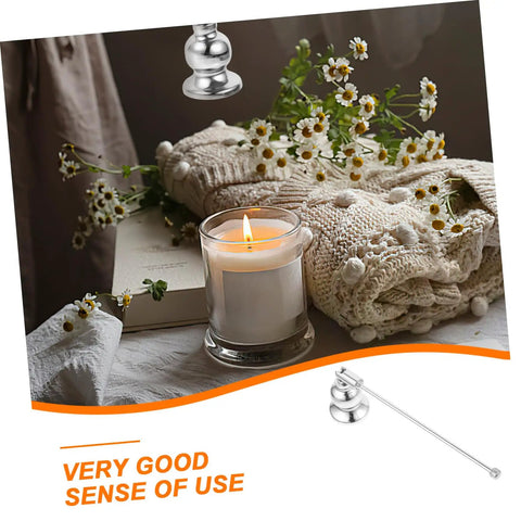 Christmas Metal Candle Fire Extinguisher Cap With Long Handle above a lit candle and cozy sweater with flowers.