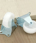 Heavy Duty Rubber Furniture Casters That Roll Like Butter With Reliable Grip Crafted For Serious Hauling And Stress Free Room Refresh Projects Without Any Floor Scrapes Or Rough Dragging, 1 inch rubber wheels on steel mounting cups.