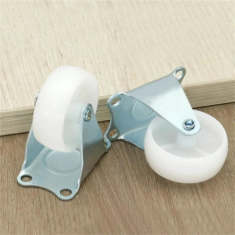 Heavy Duty Rubber Furniture Casters That Roll Like Butter With Reliable Grip Crafted For Serious Hauling And Stress Free Room Refresh Projects Without Any Floor Scrapes Or Rough Dragging, 1 inch rubber wheels on steel mounting cups.