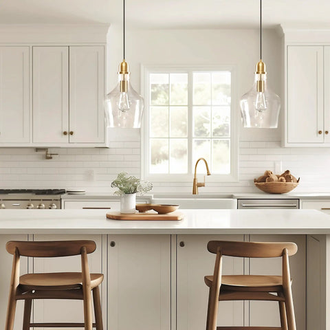 Hand Blown Glass Bell Pendant Light in Gold and Clear, Industrial Farmhouse Style, 9 Inch Shade over kitchen island with wooden stools.