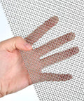 Hand holding 4 Pack Stainless Steel Wire Mesh Sheets 12 By 8 Inches For DIY Projects No Rust Easy To Cut Durable As Heck And Ready For Pro Grade Craft Screen Mesh Set