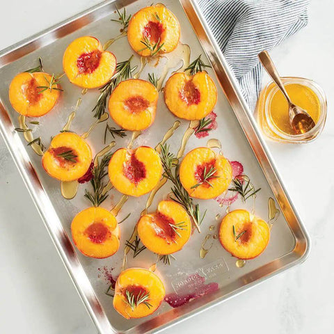 Naturals Half Sheet Pan Set Of 2 For Baking And Roasting With Pure Aluminum For Superior Heat Conductivity And Even Browning Encapsulated Galvanized Steel Rim Prevents Warping Usa Made Pro Grade Bakeware with peaches and rosemary