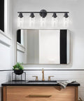 Slick Black 5 Light Vanity Fixture With Clear Glass Shades mounted above mirror in bathroom, E26 Base, sleek contemporary lighting