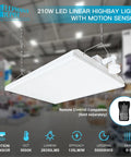 Kickass 2Ft Led Linear High Bay Shop Light 210 W 28350 Lumens Motion Sensor 5000K Daylight hanging in a commercial space.