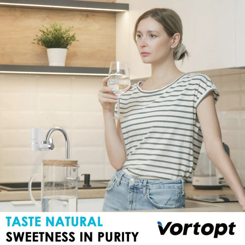 Woman drinking water beside Faucet Water Filter For Sink With Rapid Flow 400 Gallon Faucet Mount Filtration System For Tap Water NSF Certified Cuts Chlorine And No More Funky Taste Includes Four Replacement Filters Easy Install Durable Build For Everyday Use.
