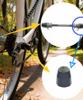 Close-up of bike wheel with 8 Pack Bicycle Axle Dust Cover Replacement Set, Durable Black Plastic Axle Caps For Bike Wheel Hubs