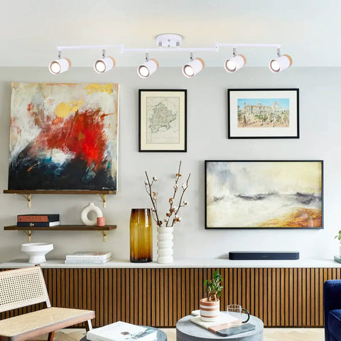 Living room with Six Light Flexible Track Lighting With 45.67 Inch Arms And 350 Degree Rotating Heads In Natural Wood Shade