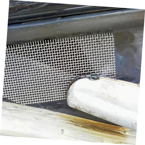 Close-up of Sturdy Stainless Steel Car Bumper Repair Mesh Kit 15 Piece No Hassle Quick Fixes Easy To Use Weldable Mesh Repair Tool Set applied