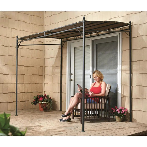 Woman reading under Small 5x8 Gazebo Canopy Tent Instant Outdoor Shelter Sun Shade For Patio Backyard Garden And BBQ Tan Color
