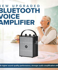 40W Bluetooth Voice Amplifier Megaphone With Wireless Microphone Headset Portable PA System For Classrooms And Events, shown on a desk with user.