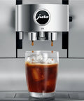 Automatic Coffee Machine With Cold Brew One Touch Brew And Sweet Hot Specialty Drinks 40 Varieties Smart Grinder Auto Adjust Aluminum White Home Coffee Maker dispensing iced coffee.
