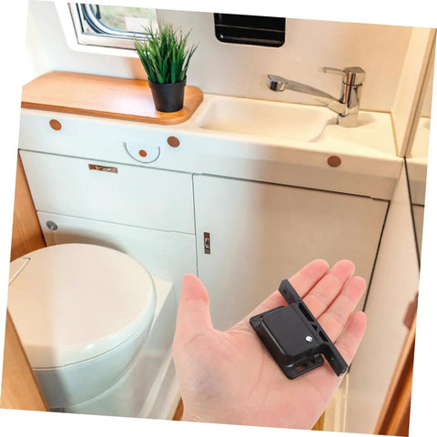 Hand holding RV Compartment Latch Kit 4 Pack Durable Trailer Locks for Cabinet Doors with side mounted design