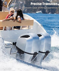 Two people on a boat powered by twin outboard engines, using 10Foot Throttle And Shift Remote Control Cable for smooth shifts.
