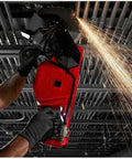 Professional using Compatible With Milwaukee M18 Fuel 18V 9 Inch Cut Off Saw, cutting material with sparks flying.