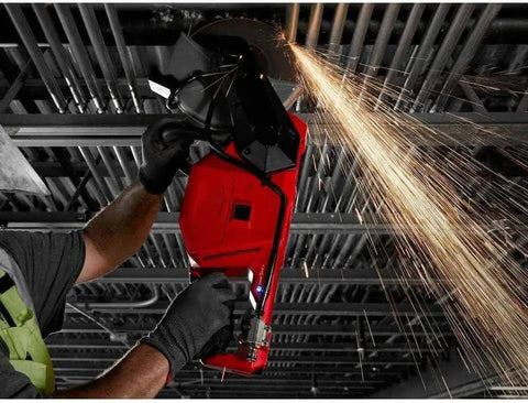 Professional using Compatible With Milwaukee M18 Fuel 18V 9 Inch Cut Off Saw, cutting material with sparks flying.