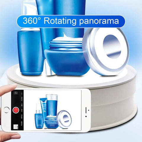 Premium Electric Rotating Display Stand With 360 Spin And Built In Lights For Jewelry Crystal Or Watch Showcase with blue skincare products.