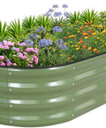Galvanized Raised Garden Bed Kit For Outdoor Use 4x2x1 Feet Durable Metal Planter Box For Vegetables And Flowers With Tools Included No Hassle Setup Green Finish showing planted flowers and greenery in a green metal frame.