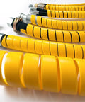 Safe-Spiral Pre-Cut Hose And Cable Protector Wrap Slick Spiral Shield - Yellow HDPE, 1 Inch OD, 25 Foot Pre-Cut Length shown on hoses