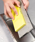 Front view of SHARPAL 145H diamond lapping plate, 10 x 4 inches, yellow block used to flatten a whetstone in a sink.