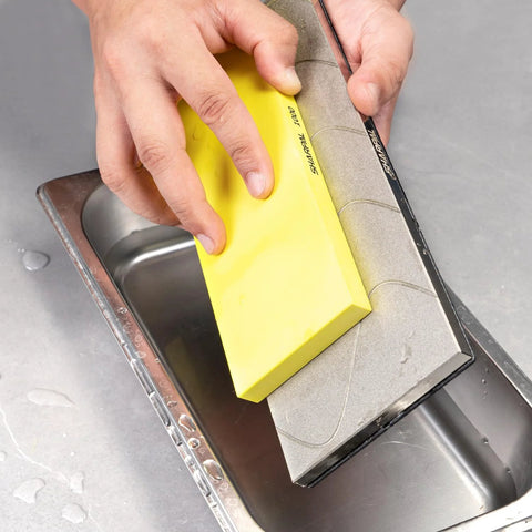 Front view of SHARPAL 145H diamond lapping plate, 10 x 4 inches, yellow block used to flatten a whetstone in a sink.