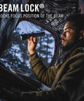 Person using Beastly Bright 4000 Lumen USB C Rechargeable LED Flashlight with Slide Focus inside tent outdoors.