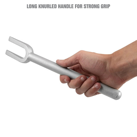 Hand holding a 15 16 Inch Ball Joint Separator Pickle Fork Tool Tie Rod Tool Heavy Duty Steel with a long knurled handle for grip.