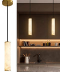 Omgomne Natural Spanish Alabaster Pendant Light 11.8 inch hanging above kitchen counter with black and brass details.