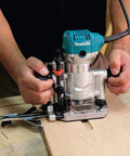 Person using Beefy One And One Quarter Horsepower Compact Router Kit With Variable Speed From 10000 To 30000 RPM Rack And Pinion
