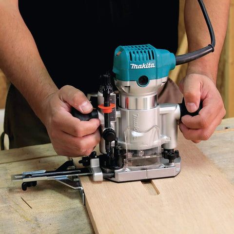 Person using Beefy One And One Quarter Horsepower Compact Router Kit With Variable Speed From 10000 To 30000 RPM Rack And Pinion