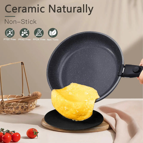 Nonstick frying pan with omelette in Ceramic Pots And Pans Set With Detachable Handle For Easy Cleanup Nonstick Cookware That Is PFAS Free PFOA Free PTFE Free Non Toxic Coating Dishwasher And Oven Safe Induction Compatible 15 Piece Grey Kitchen Set