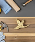 Brass Leaf Drawer Pulls For Cabinets And Dressers Dope Vintage Style Cabinet Handles next to tools on a wooden background