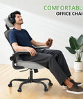 Man relaxing on ergonomic office chair for long hours, boss level comfort high back desk chair with adjustable headrest and lumbar support.