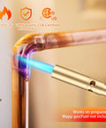 Beast Mode Brass Propane Torch Head With Manual Start in use soldering a copper pipe, showing blue flame, CGA600 compatible