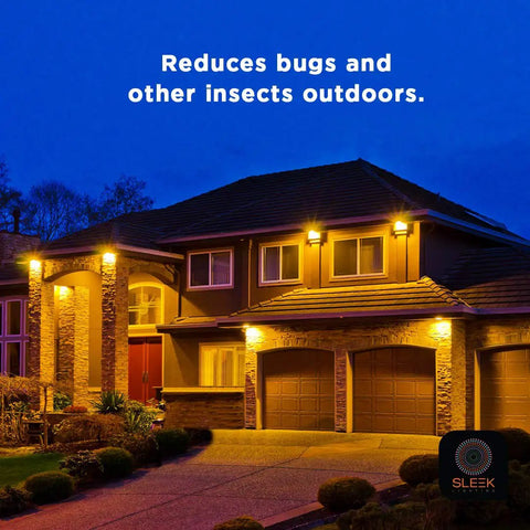 House lit with warm lights at night, promoting bug reduction. Black Light 23 Watt Spiral CFL Bulbs 120V E26 Base UL Approved Energy Saver Pack Of 4.