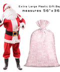 Pink Jumbo Plastic Gift Bag With Baby Girl Design Includes Tag And Tie 56 X 36 Inches Extra Large next to Santa Claus figure