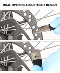 Disc Rotor Truing Fork Tool Kit For Bicycle Brake Pad Alignment And Rotor Calibration in use, showing dual opening adjustment design