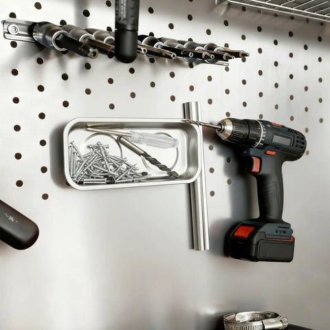 10 Piece Magnetic Tray Set For Tools And Tiny Parts holding screws on a pegboard with drill