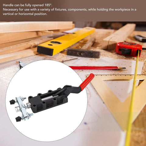 Heavy Duty 50mm Stroke Double Headed Push Pull Toggle Clamp For Welding Fixtures With Ribbed Handles And Nodular Cast Iron Base on a workbench with tools.