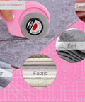 Close-up of pink rotating cutting tool with ergonomic handle on fabric swatches, showcasing felt, leather, and fur.