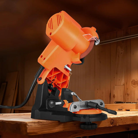 Tough Electric Chainsaw Sharpener Bench Mounted Eighty Five Watt Motor Spins Up To Five Thousand Rpm With Dual Grinding Discs on wooden workbench.