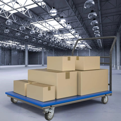 Industrial cart dolly with blue platform and four swivel caster wheels, carrying several cardboard boxes in a warehouse