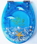 Universal Soft Close Toilet Seat Top Notch Euroresin Construction With Quick Release Hinges featuring ocean design with dolphins.