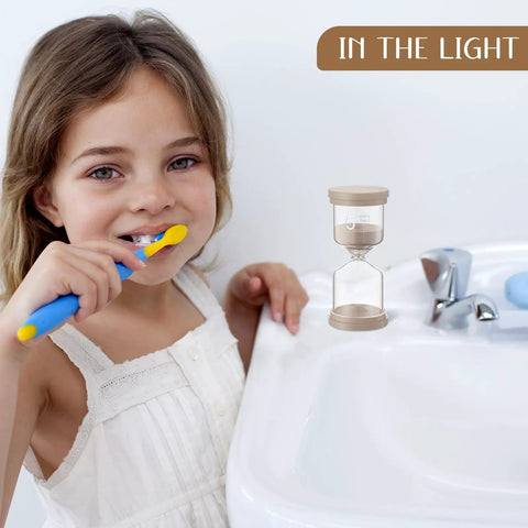 Child brushing teeth with Nine Colorful Luminous Sand Timers Set With 0.5, 1, 2, 3, 5, 10, 15, 20, 30 Minute Intervals Glow In The Dark.