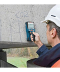 Heavy Duty Handheld Wall Scanner And Stud Detector Real Workhorse Multi Function Finder For Wood Studs Live Wires Steel Bars Water Pipes Plus Bullseye Center Locator Tool in use on concrete surface